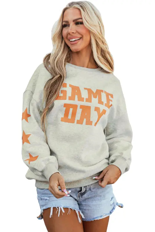 New in grapefruit orange game day graphic sweatshirt