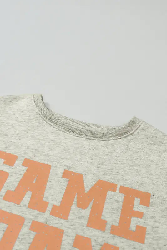 New in grapefruit orange game day graphic sweatshirt