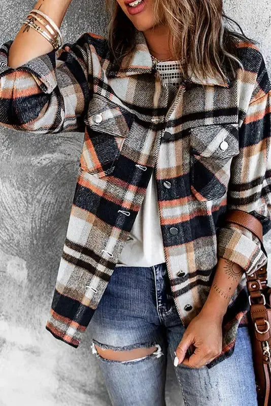 Close-up of geometric plaid print and functional pockets on shacket Fashionfitz UK