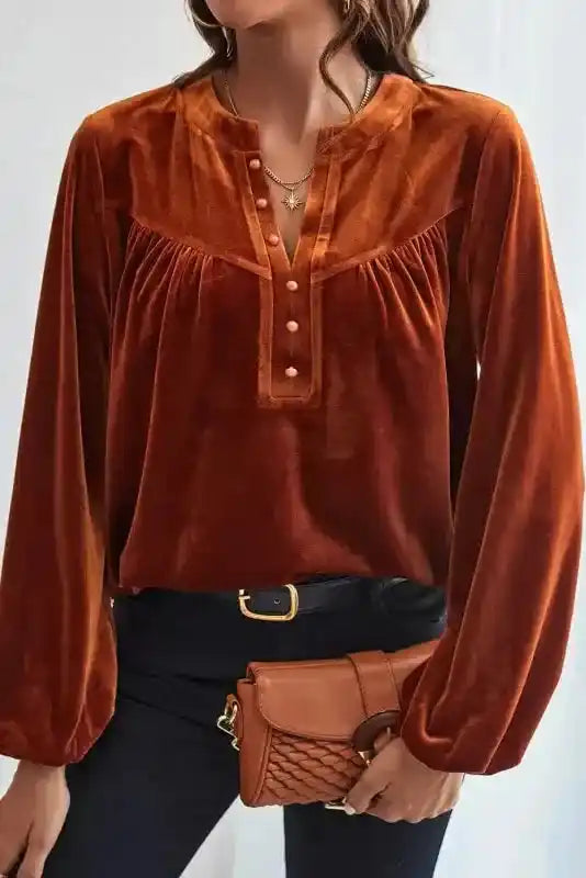 Front view of the Gold Flame Beaded Velvet Top styled with accessories, ideal for holiday or night-out occasions.
