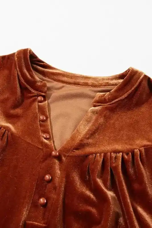 Neckline detail of the Gold Flame Beaded Velvet Top featuring decorative buttons and gathered yoke design.