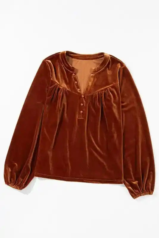 Flat lay of the Gold Flame Beaded Velvet Top displaying its rich velvet fabric and buttoned neckline design.
