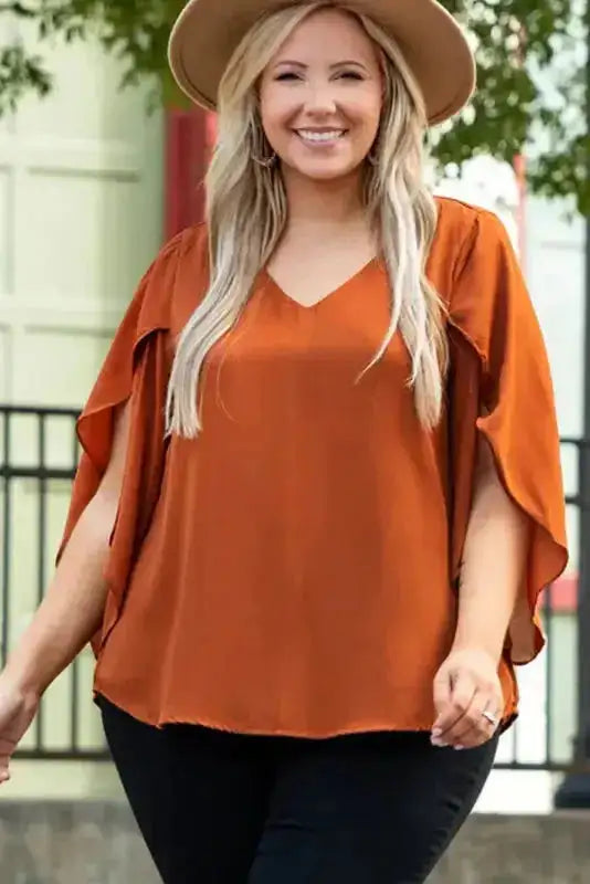 Gold Flame V-Neck Blouse in plus size with wrapped sleeves, styled with a hat for a confident and feminine summer outfit.
