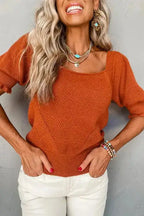 Rust textured knit top with square neck and bubble sleeves styled with white pants, ideal for summer daily wear.