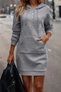 Gray Textured Kangaroo Pocket Drawstring Hooded Mini Dress with ribbed fabric and buttoned neckline, styled for casual winter wear.
