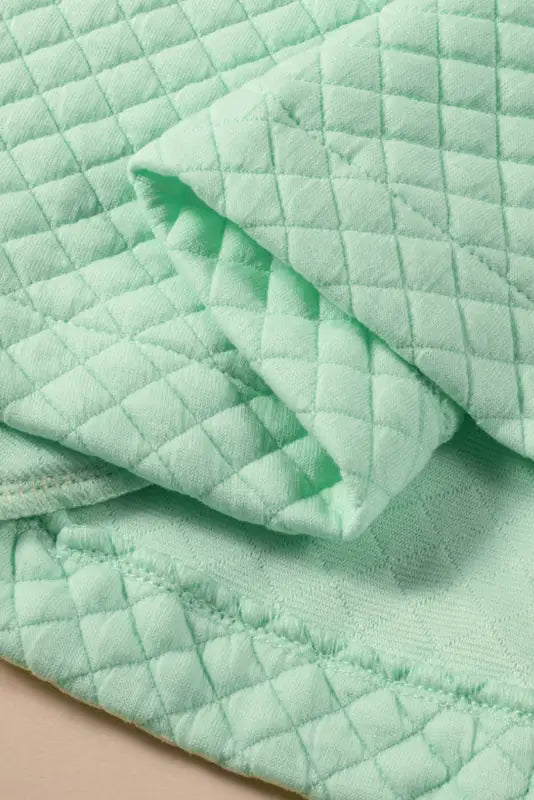 Green color block patchwork flap pocket quilted shacket