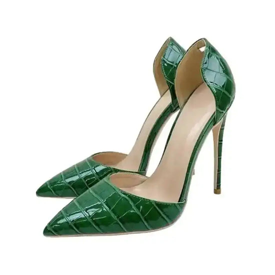 Side angle of croc-effect green stilettos with high stiletto heel and open side cut, ideal for elegant evening outfits.