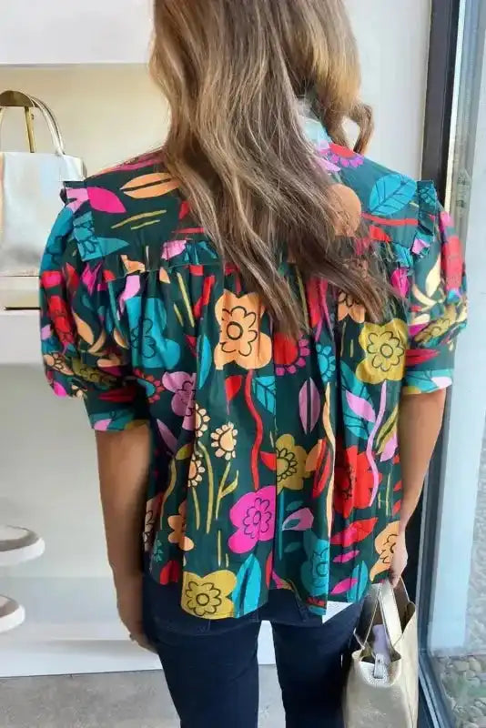 Back view of Floral V-Neck Puff Sleeve Cotton Blouse showing relaxed shift silhouette and frill detail — Fashionfitz