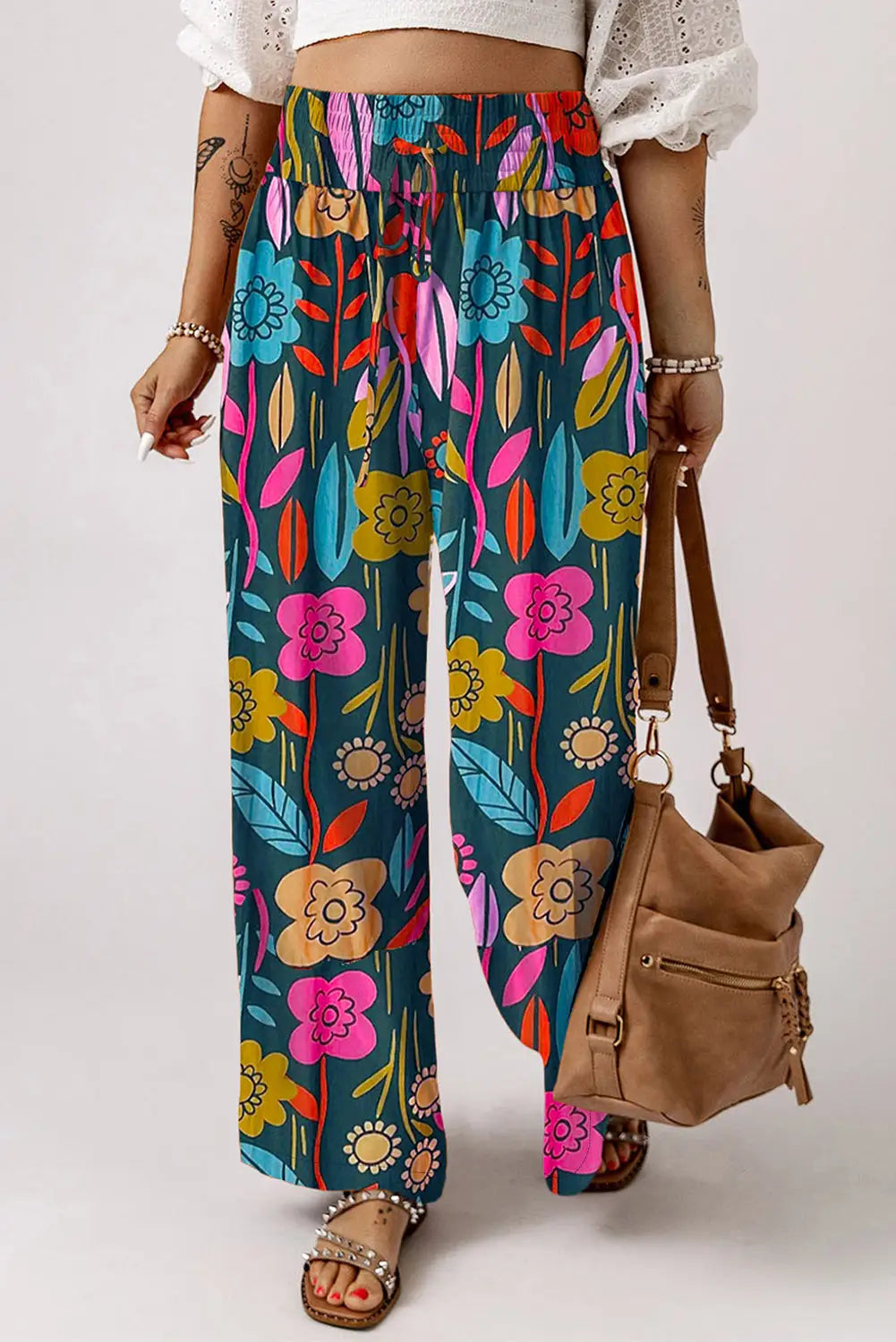 Green floral smocked waist loose pants - trousers