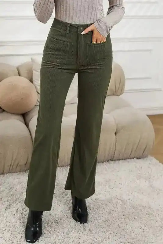 Front view of green high waist corduroy pants women with square pockets. Medium stretch fabric offers a flattering, leg-lengthening fit.
