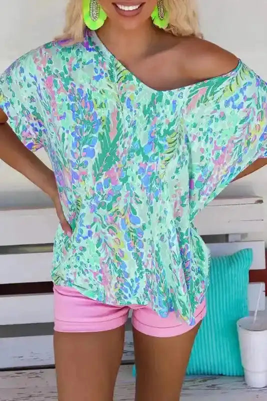 Green floral graffiti print V-neck loose fit short sleeve tee front view — Fashionfitz UK
