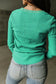 Green trimmed neckline waffle knit henley top - long sleeve tops