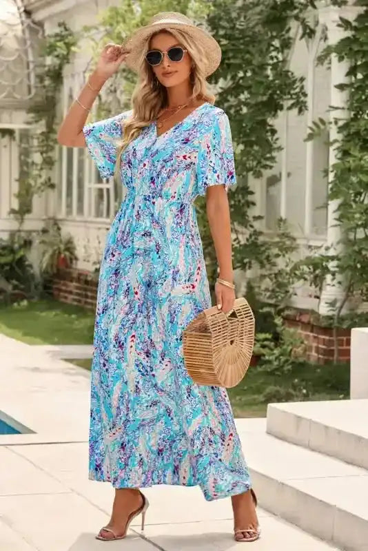 Floral Maxi Dress with V Neck styled with sun hat and heels, perfect for vacation or outdoor events with its breezy wrap silhouette.
