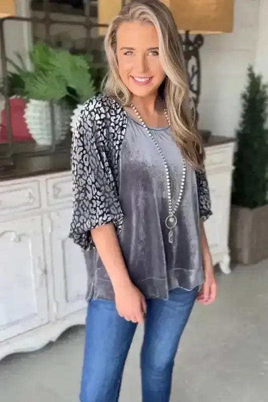 Medium grey velvet blouse with leopard print lantern sleeves, perfect for autumn occasions with a stylish Southern Belle flair.