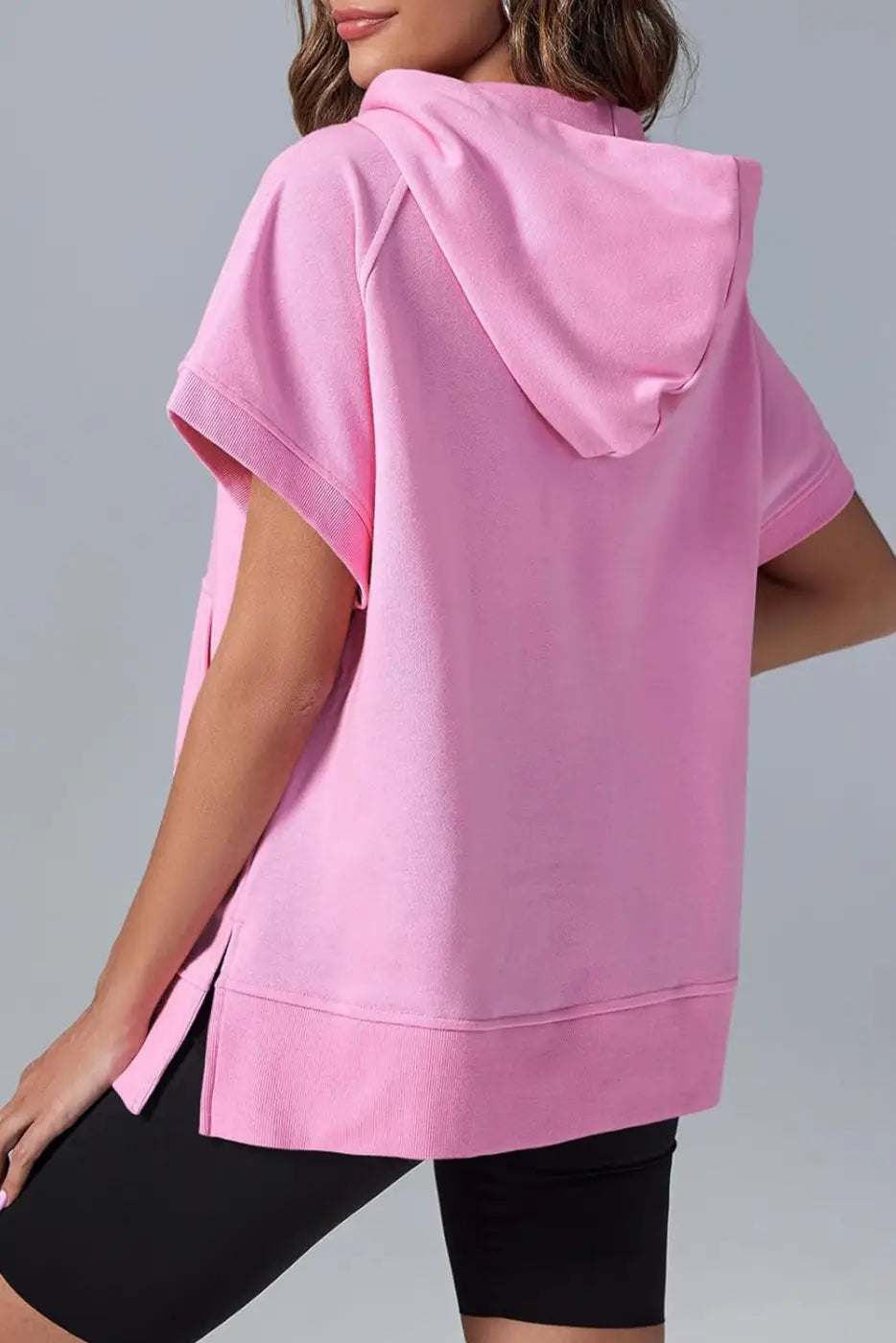 Pink half zip hopper hoodie: relax in style with a hooded short-sleeve sweatshirt and side slits