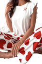 Women’s wide‑leg lounge set with heart‑print pants and solid top in pink, styled for comfort and casual wear