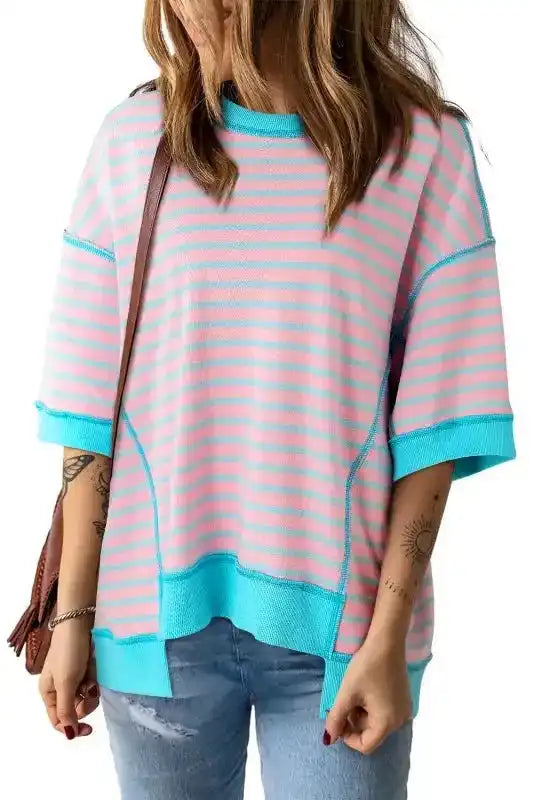 Side view of Pink Stripe Oversized High Low T-Shirt showing high-low hem and contrast trim detail — Fashionfitz