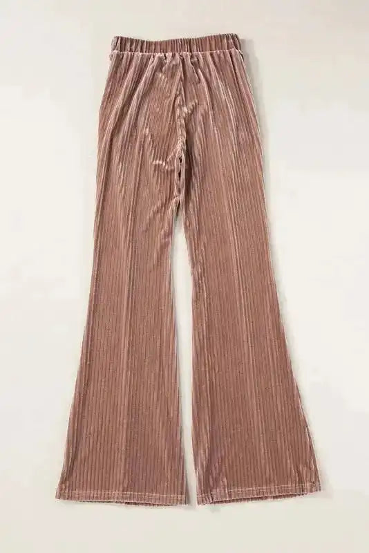 Back flat lay of wide leg flare corduroy pants for women, showcasing elastic waistband and cozy corduroy fabric.