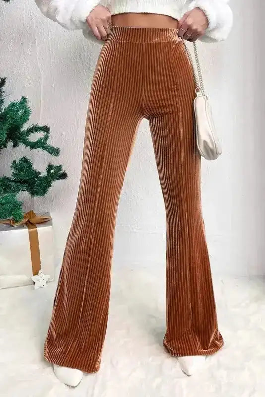 Women's high waist flare corduroy pants in solid brown, showcasing a flattering fit and soft texture for chic winter fashion.