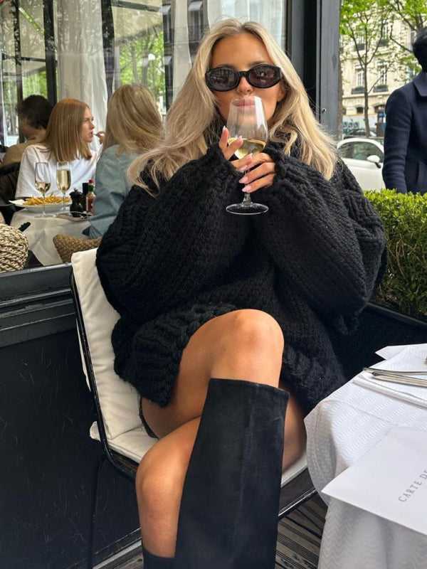 Black fluffy chunky knit turtleneck jumper paired with knee-high boots, perfect for casual winter outings and cozy café looks.