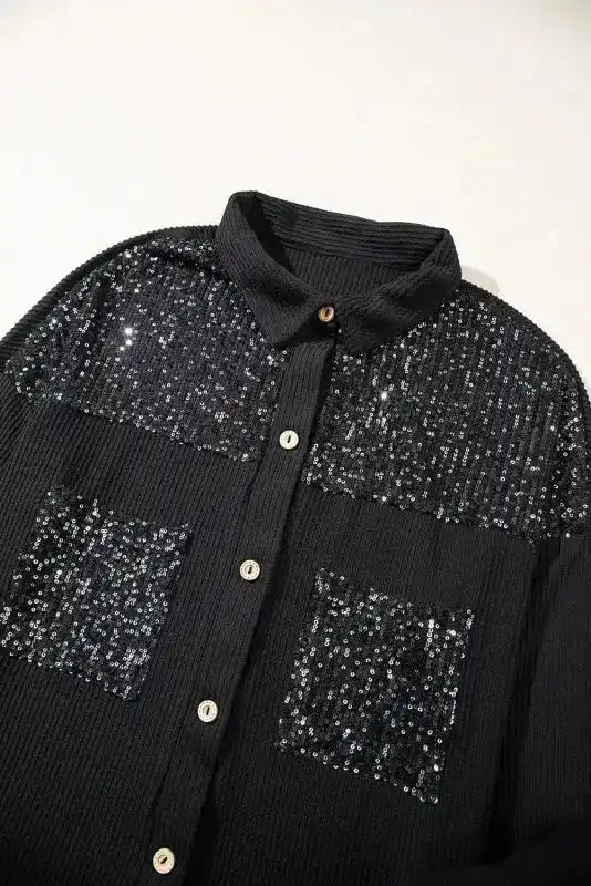 Flat lay of Women’s Black Sequin Patch Corded Shacket Overshirt showing button details, sequin chest pockets, and corded fabric.