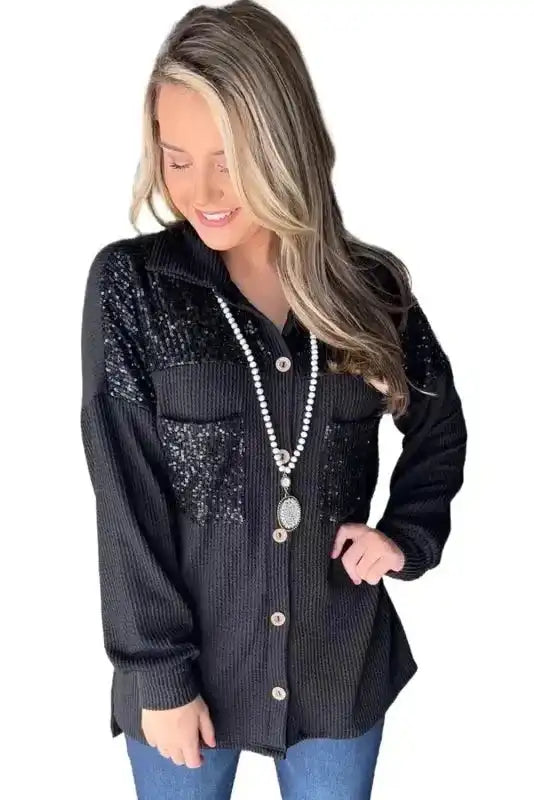 Studio shot of Black Sequin Patch Corded Shacket Overshirt for women, highlighting sequin embellishments and ribbed texture.