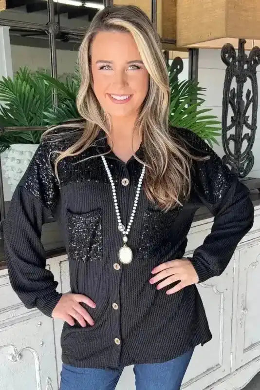 Model wearing Women’s Black Sequin Patch Corded Shacket Overshirt with long sleeves and button-down front, perfect for daily wear.