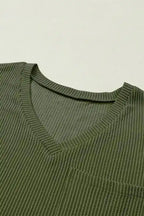 Close-up of V-neckline on olive green corded T-shirt, highlighting ribbed fabric texture and soft, breathable material for daily comfort.