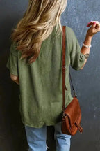 Back view of olive green corded V-neck loose T-shirt for women, showcasing relaxed fit and ribbed fabric texture in casual styling.