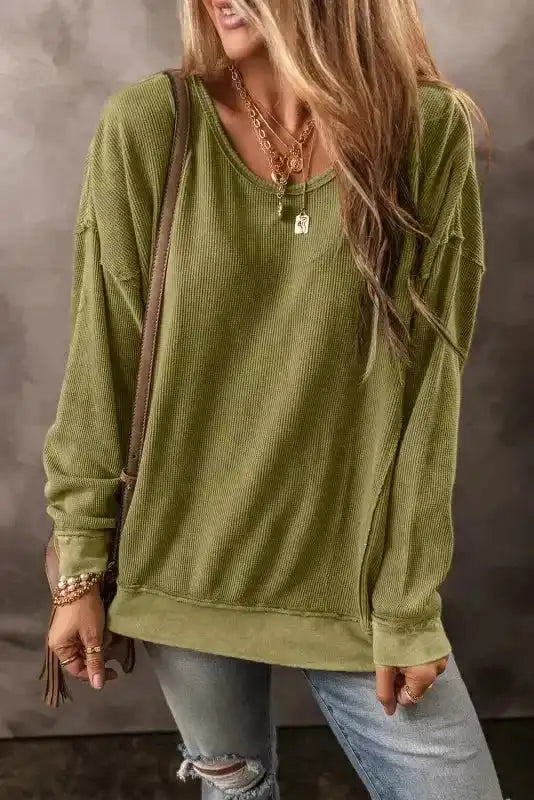 Women's ribbed Jungle Green Textured Sweatshirt from FashionFitz styled with layered gold necklaces and distressed denim jeans.