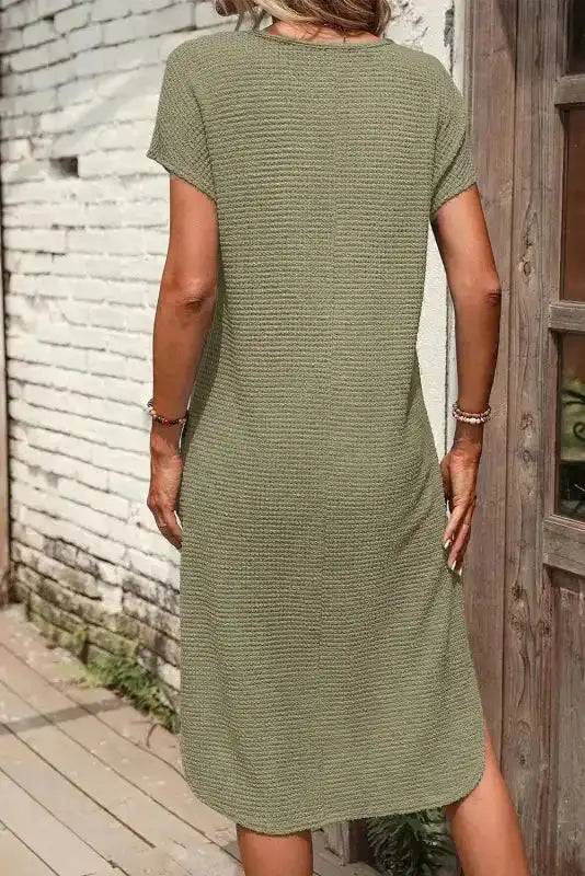 Back view of Jungle Green Waffle T-shirt Dress showing H-line silhouette and soft waffle texture, ideal for everyday casual outfits.