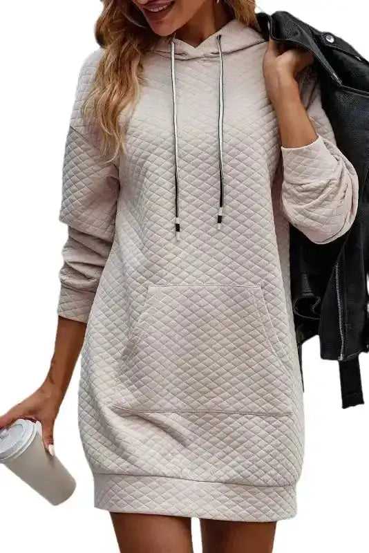 Isolated view of Quilted Hooded Dress - Kangaroo Pocket on white background, highlighting texture and design.