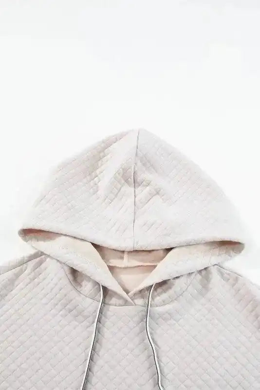 Close-up of hood on Quilted Hooded Dress - Kangaroo Pocket, showing detailed quilted stitching and soft lining.