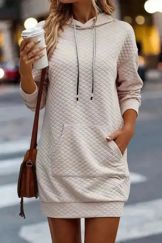 Front view of Quilted Hooded Dress - Kangaroo Pocket styled with a crossbody bag, perfect for daily casual wear.