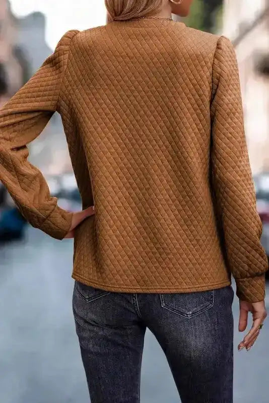 Back view of quilted hooded dress in camel brown with long sleeves, showcasing diamond stitching and casual fit for daily wear.
