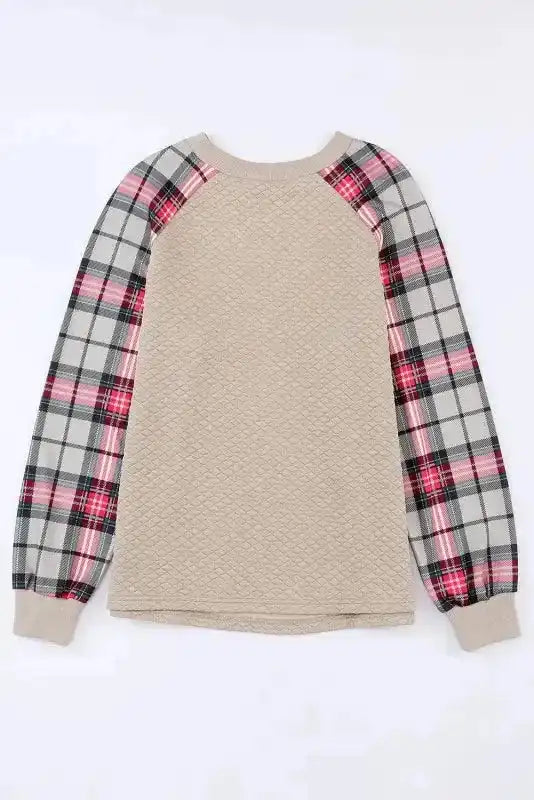 Back flat lay of quilted hooded dress with plaid sleeves, showcasing full-length design and soft quilted fabric.