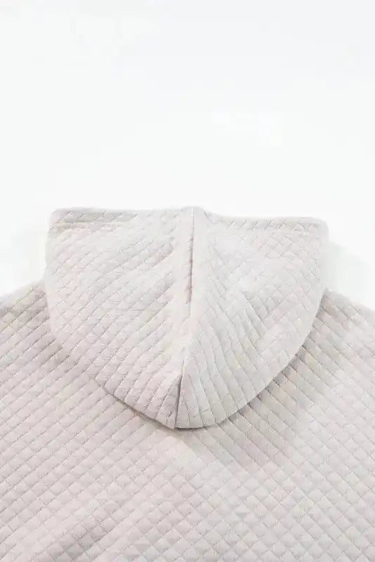 Back hood detail of Quilted Hooded Dress - Kangaroo Pocket, emphasizing soft texture and casual style.