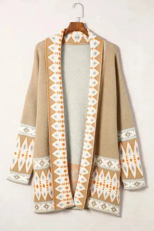 Flat lay of Khaki Aztec Knit Duster Cardigan on hanger, displaying full Aztec pattern on front and sleeves.