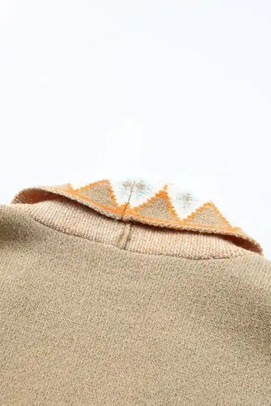 Back neckline detail of Khaki Aztec Knit Duster Cardigan with visible stitching and Aztec collar trim.