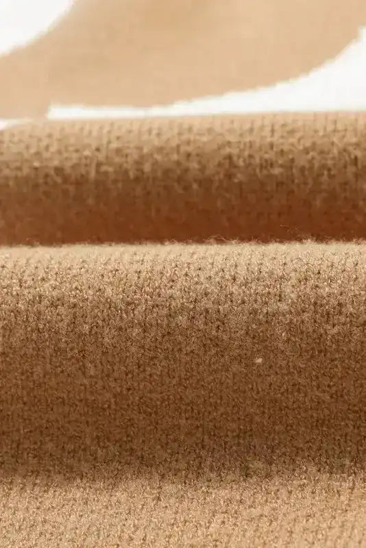 Fabric texture close-up of Khaki Floral Drop Shoulder Sweater, highlighting soft, cozy knit ideal for fall wear.