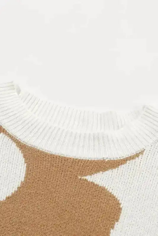 Detail of ribbed neckline on Khaki Floral Drop Shoulder Sweater, emphasizing quality knit and soft fabric texture.