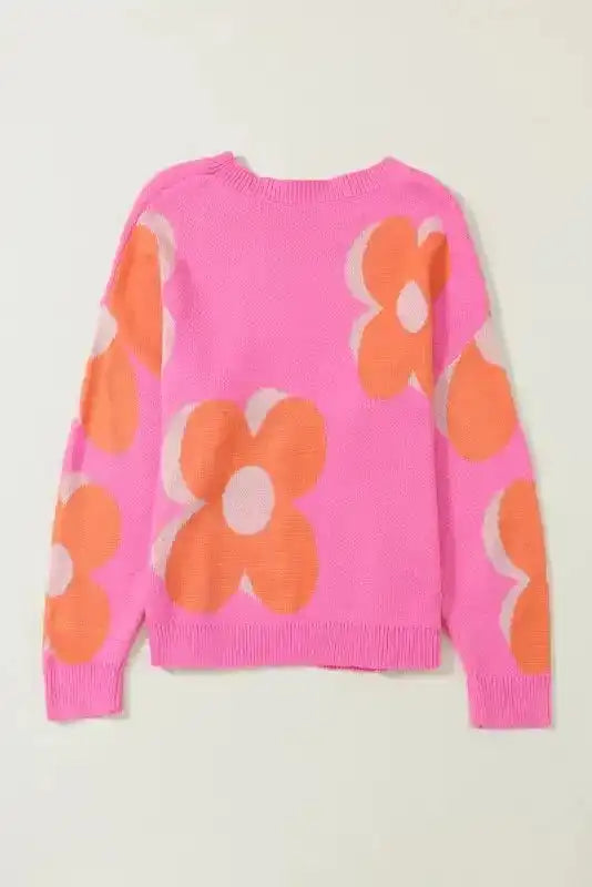 Back view of Khaki Floral Drop Shoulder Sweater showing full floral pattern and relaxed fit in vibrant pink and orange tones.