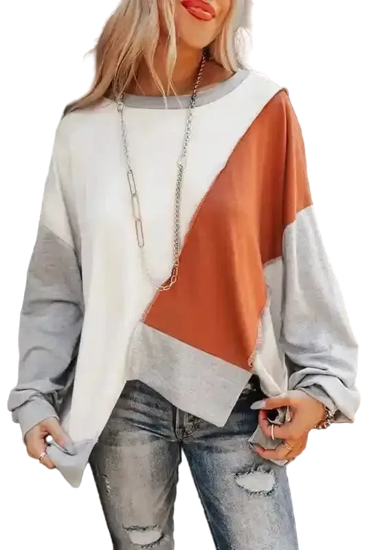 Khaki Colorblock Stitching Irregular Hem Long Sleeve Top with patchwork design in white, rust, and gray, styled with distressed jeans.