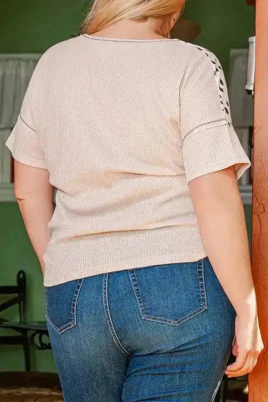 Back view of Khaki Plus Size Leopard Print Colorblock V Neck T Shirt showing solid khaki ribbed fabric and short sleeves.