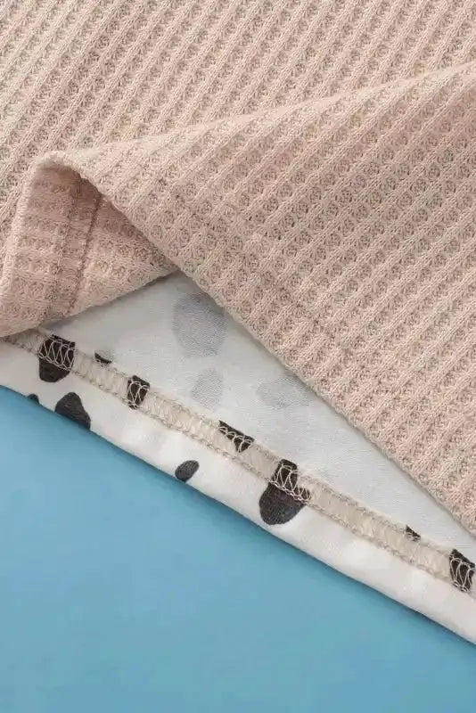 Detailed view of inner stitching and fabric layers of Khaki Plus Size Leopard Print Colorblock V Neck T Shirt.