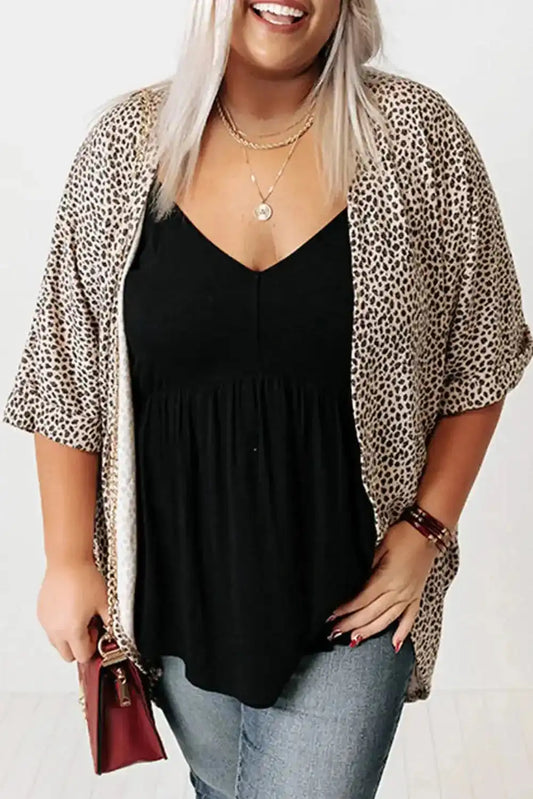 Khaki Leopard Print Cardigan - Plus Size Cardigans | FashionFitz featuring a loose fit and short sleeves, styled over a black top and jeans.