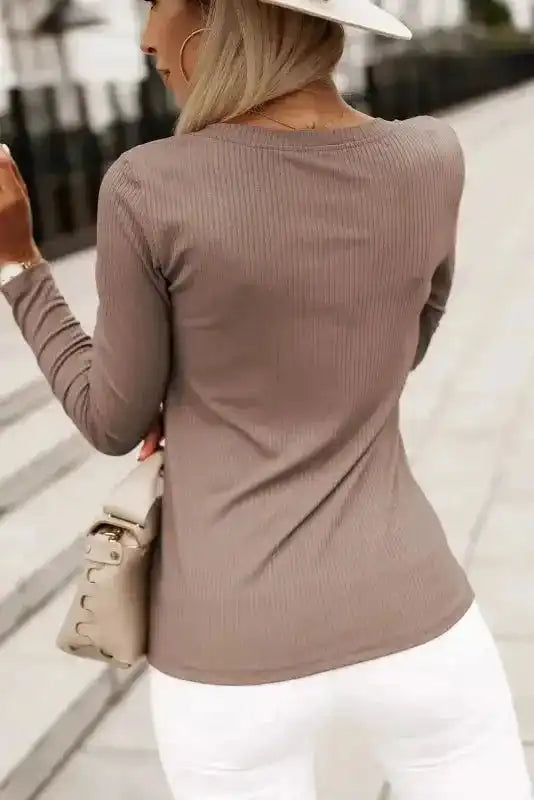 Back view of khaki V-neck knit top showing ribbed knit detail and slim fit design, ideal for autumn daily wear.