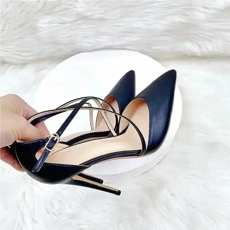 Close-up of Black Lace‑Up High Heels – Sleek Stiletto Court Shoes highlighting pointed toe and elegant cross-strap detail.