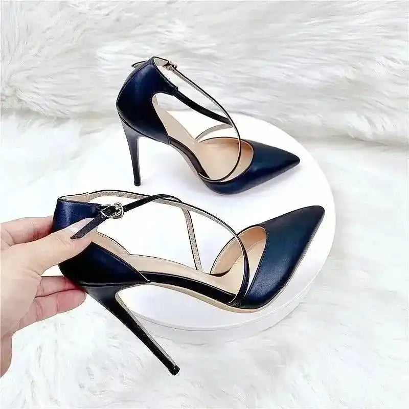 Hand holding Black Lace‑Up High Heels – Sleek Stiletto Court Shoes on white background, showcasing premium PU leather and sleek silhouette.