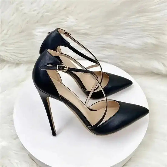Black Lace‑Up High Heels – Sleek Stiletto Court Shoes displayed on round white platform, perfect for special occasions or night outs.